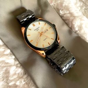 Tissot Men's Black and Gold Watch